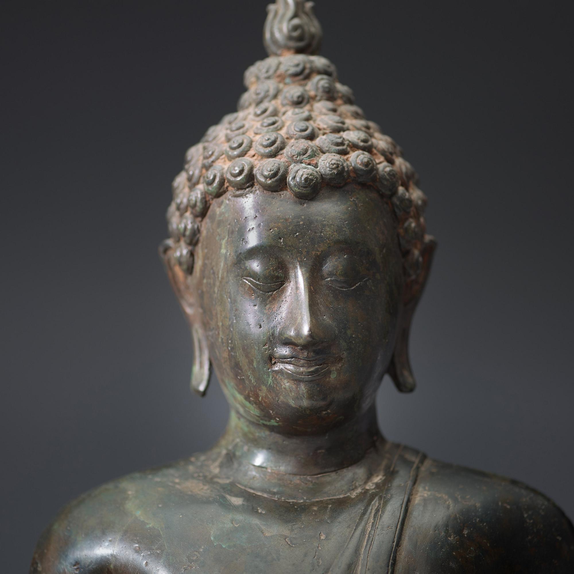 A seated bronze Buddha, Thailand, presumably Lanna, 15th/16th Century.