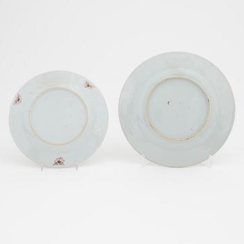 A group of ten Chinese porcelain plates and serving dish, Qing dynasty, Qianlong (1736-1795) and Jiaqing (1796-1820).