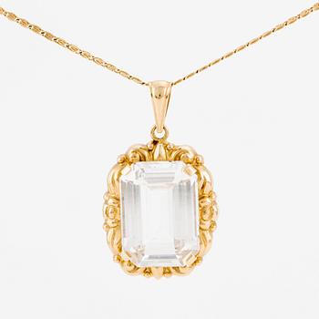 Hänge 18K guld med syntetisk vit sten samt guldkedja Uno A erre.