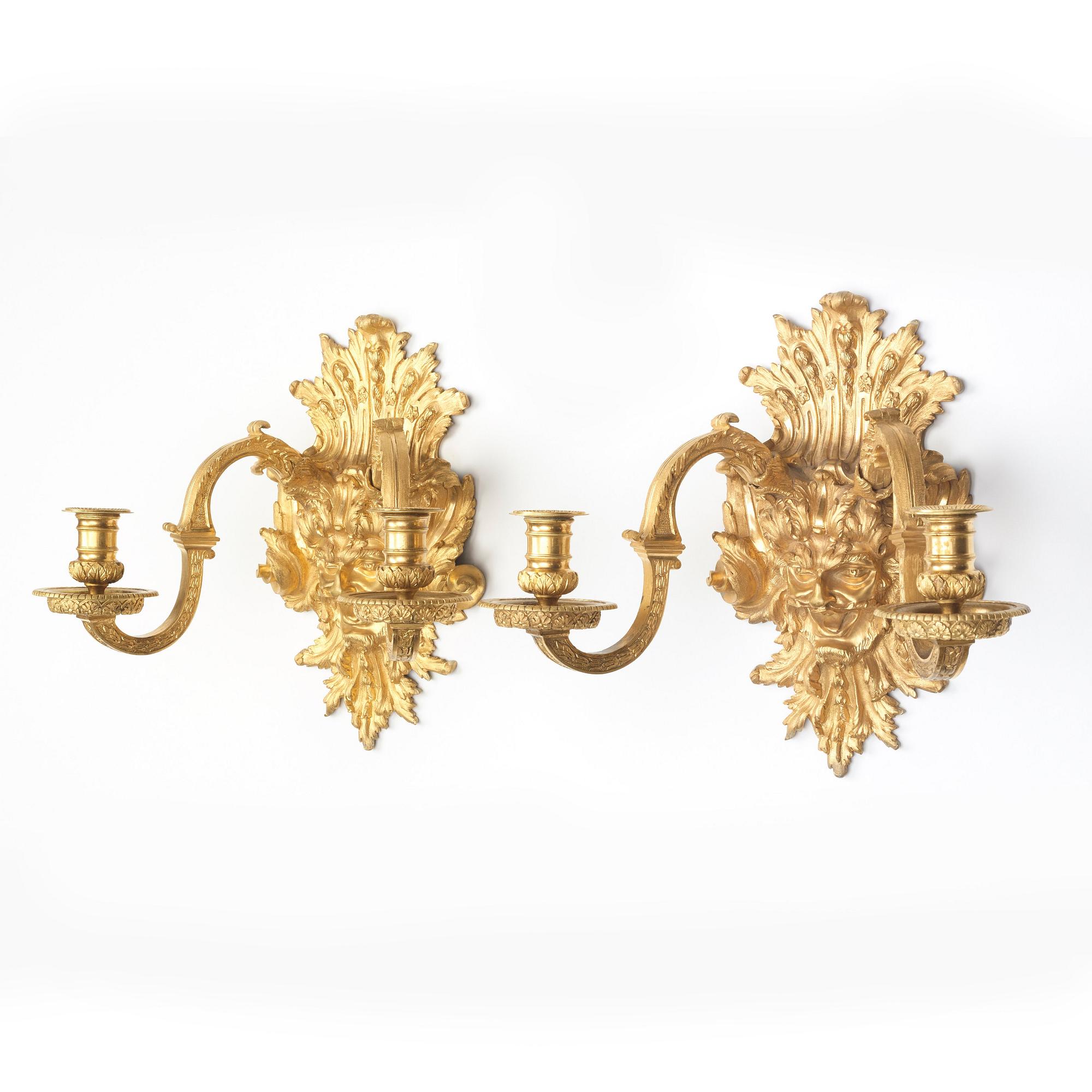 A pair of Baroque-style mid 19th century two-light wall-lights.