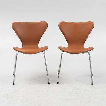 Arne Jacobsen, six 'Series 7' chairs with new leather upholstery.