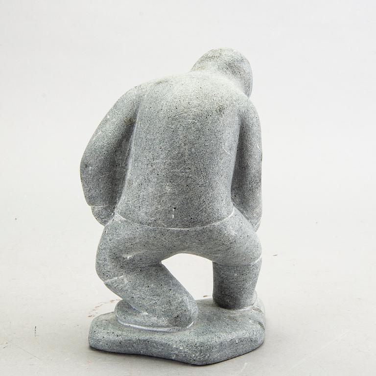 A simon Kristofferson signed stone figurine.