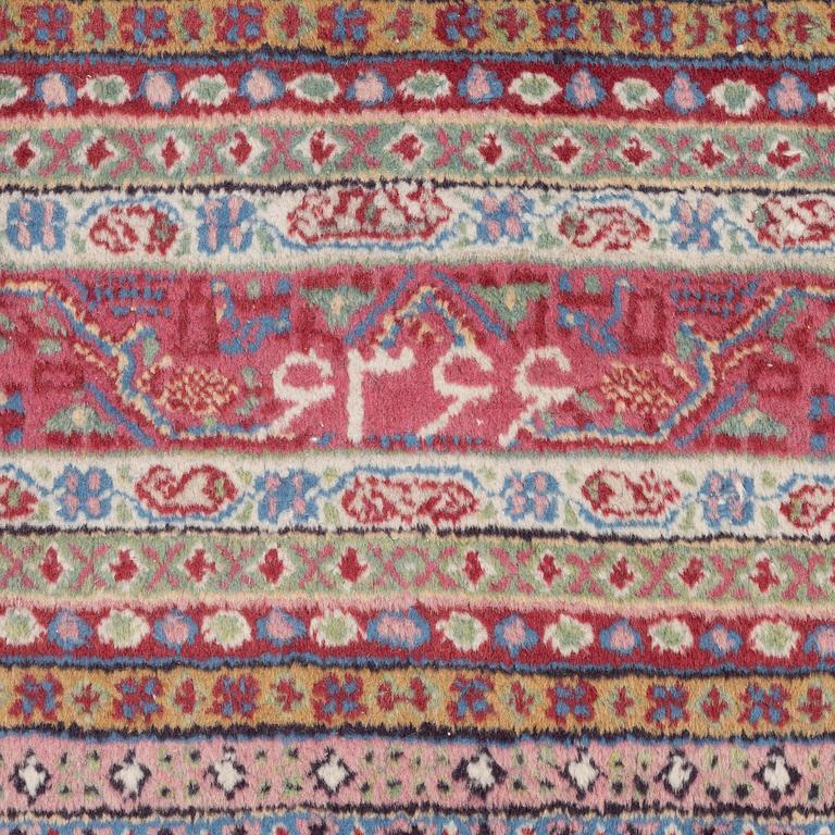 A oriental carpet, signed, c. 295 x 295 cm.