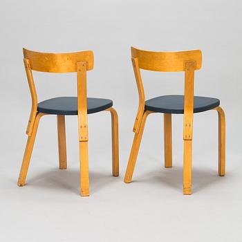 Alvar Aalto, A pair of early 1960s model 69 chairs for O.Y. Huonekalu- ja Rakennustyötehdas A.B.