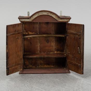 A 19th century painted cabinet.