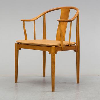 A 'China' chair by Hans J Wegner, for Fritz Hansen, Denmark, late 20th century.