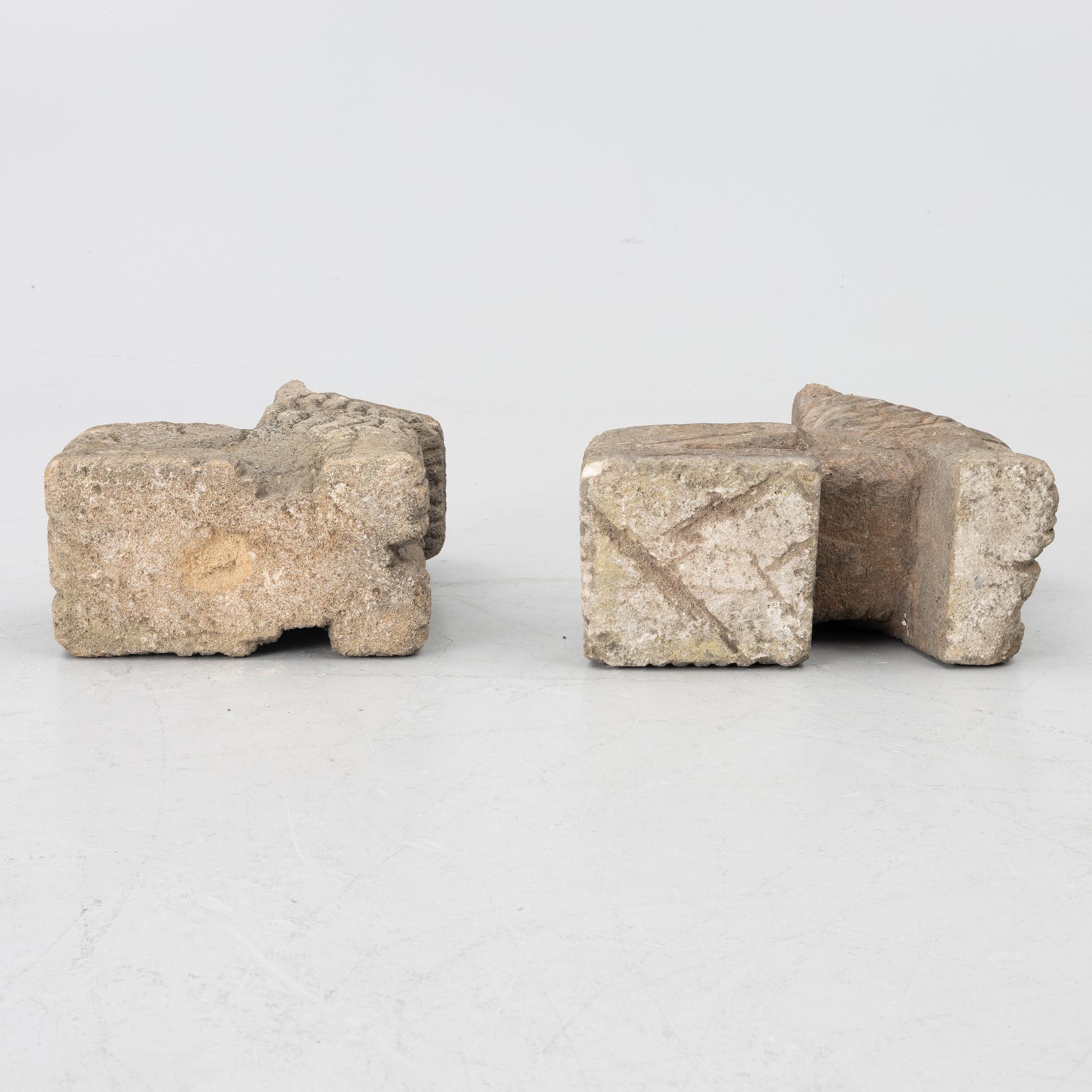 A set of two lion garden sculptures.
