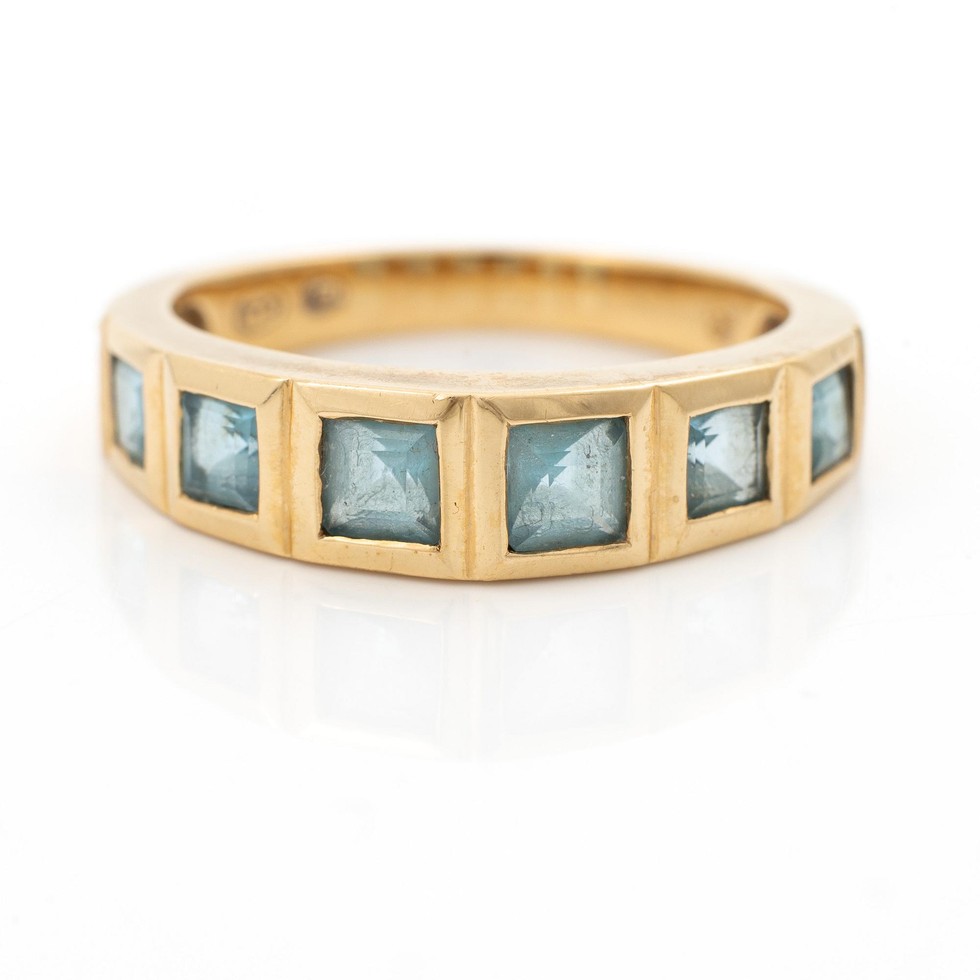 Ring, 18K gold with topazes.
