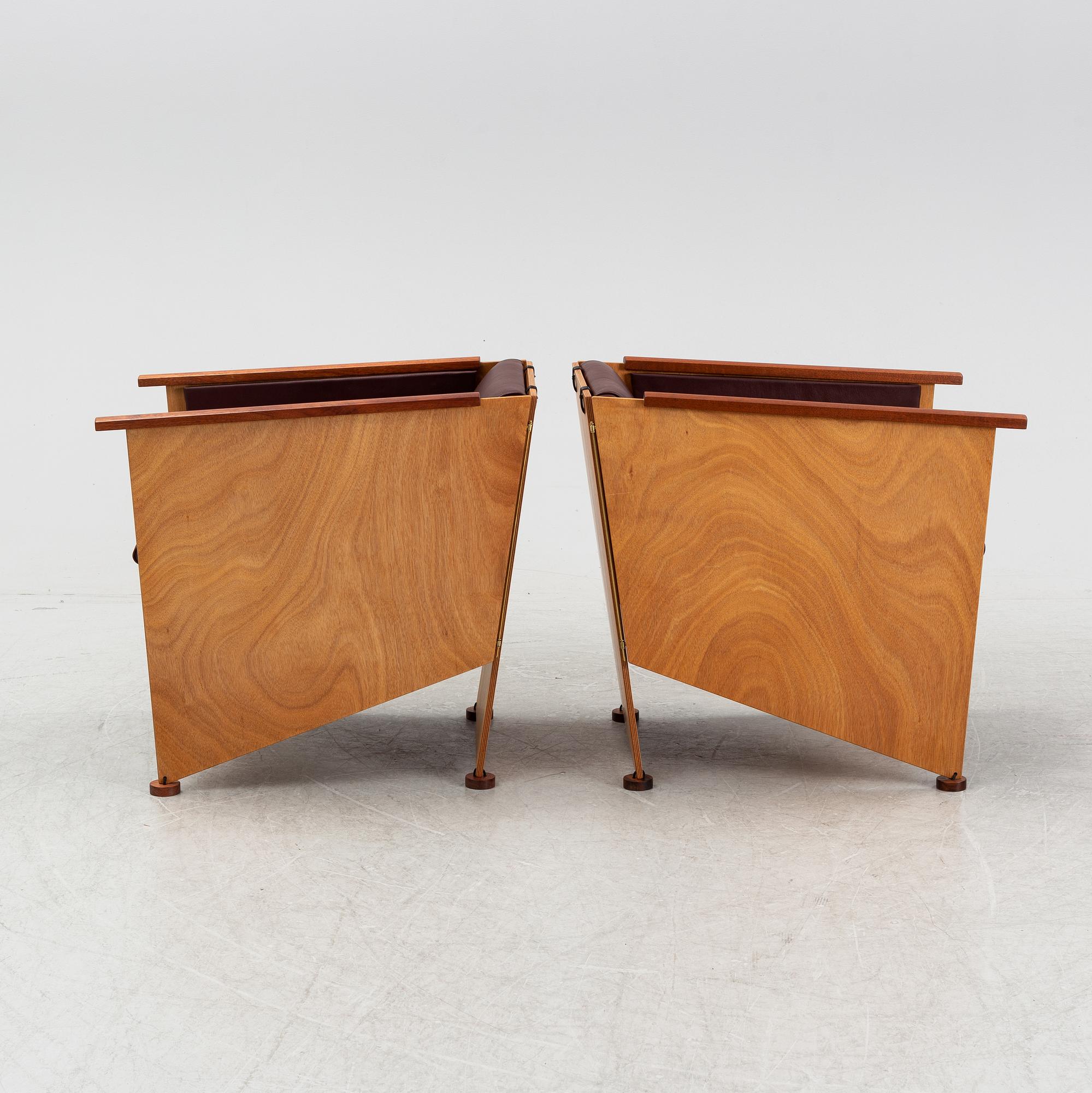 Torbjörn Ahlström, a pair of mahogany and cherry armchairs.