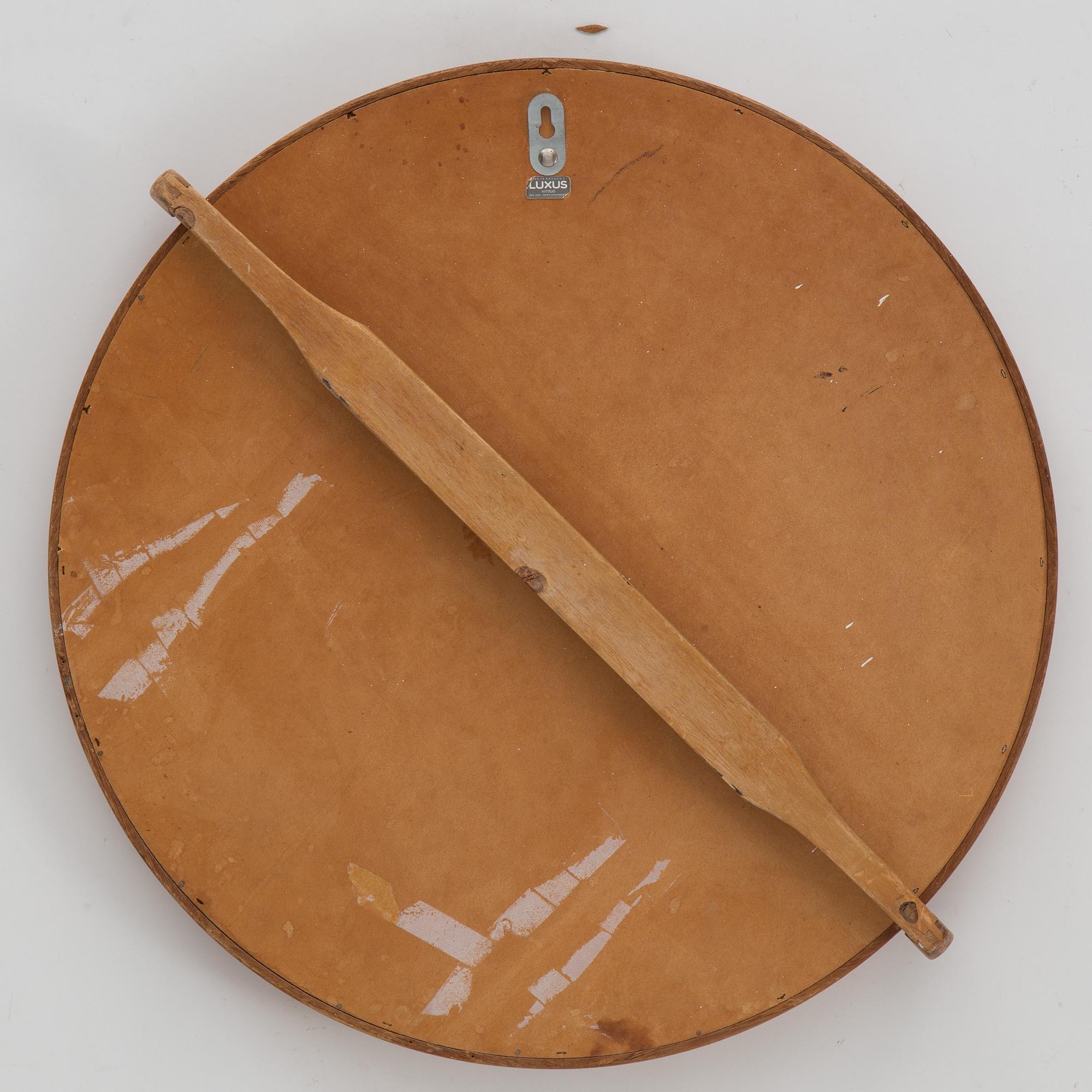 A mirror by Uno & Östen Kristiansson, Luxus, Vittsjö.