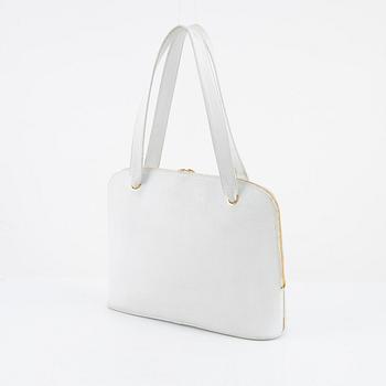 Chanel, a white caviar vintage bag.