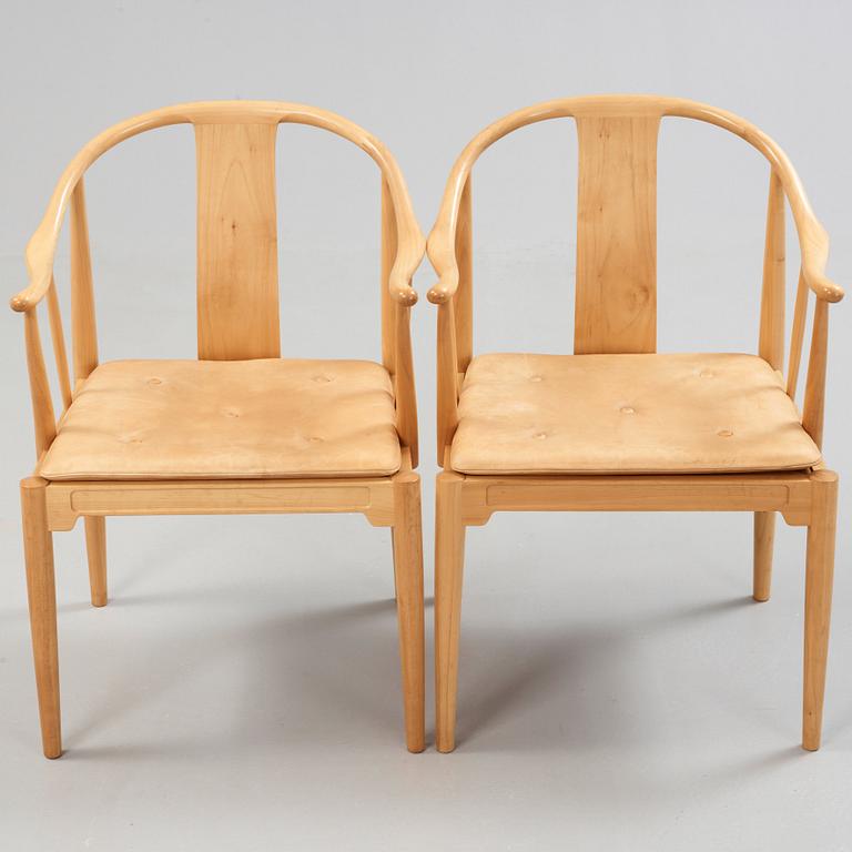 A pair of Hans J Wegner 'China chairs', Fritz Hansen, Denmark 1986-87.