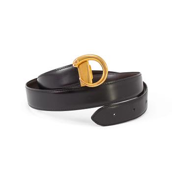 A black leather belt by Cartier.