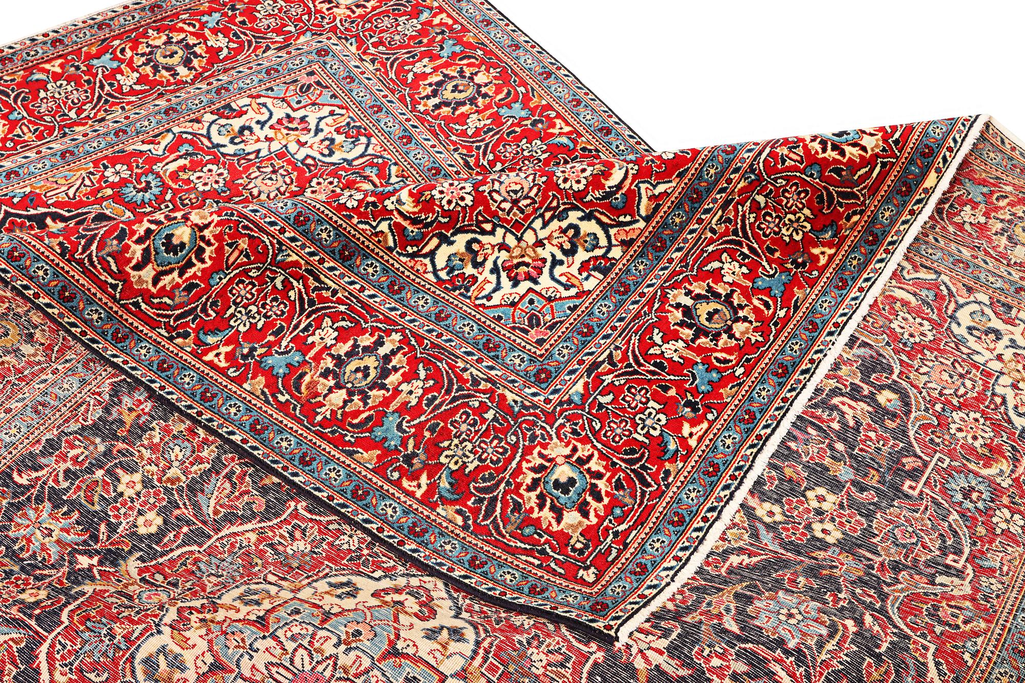 A Kashan carpet, a. 300 x 195 cm.