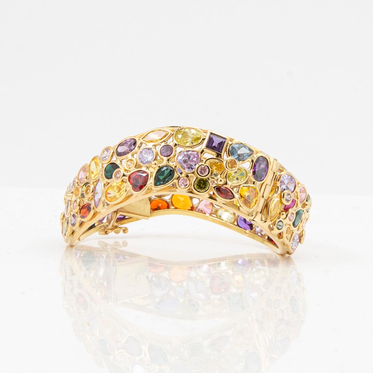 Armring, 18K gold with coloured gemstones, Italy.