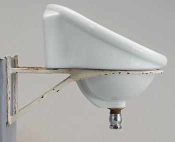 An Alvar Aalto molded porcelain wash basin for the Paimio Sanatorium, Arabia, Finland 1930's.