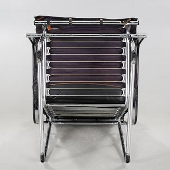 A pair of "Remmi 817H-1K" chairs, designed by Yrjö Kukkapuro in 1969, made by Haimi Oy or Avarte Oy.