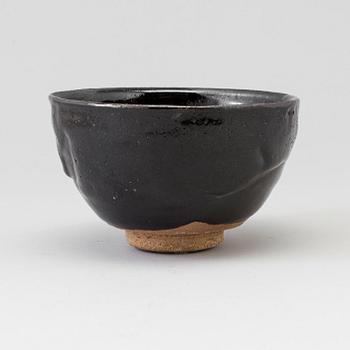 A Japanese Raku stoneware bowl, 20th century.