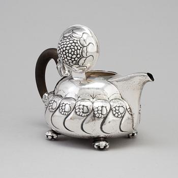 A Danish Art Nouveau silver teapot, maker's mark EVALD NIELSEN, Copenhagen, 1919.