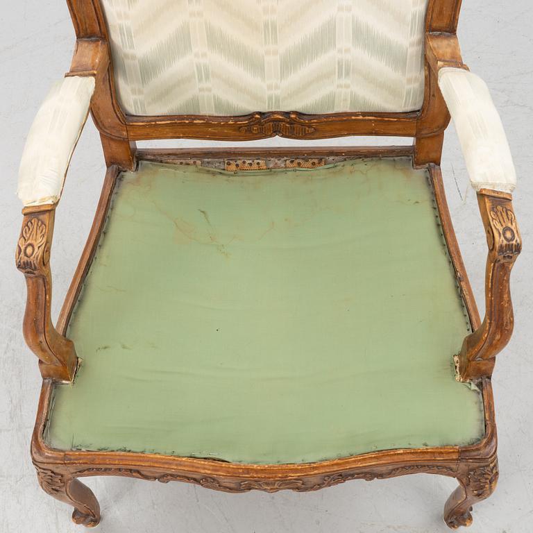 A pair of French Louis XV fauteuils, mid 18th century.