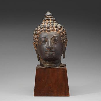 391. A large Lanna style sculpture head of Buddha, Thailand, 17/18th Century.