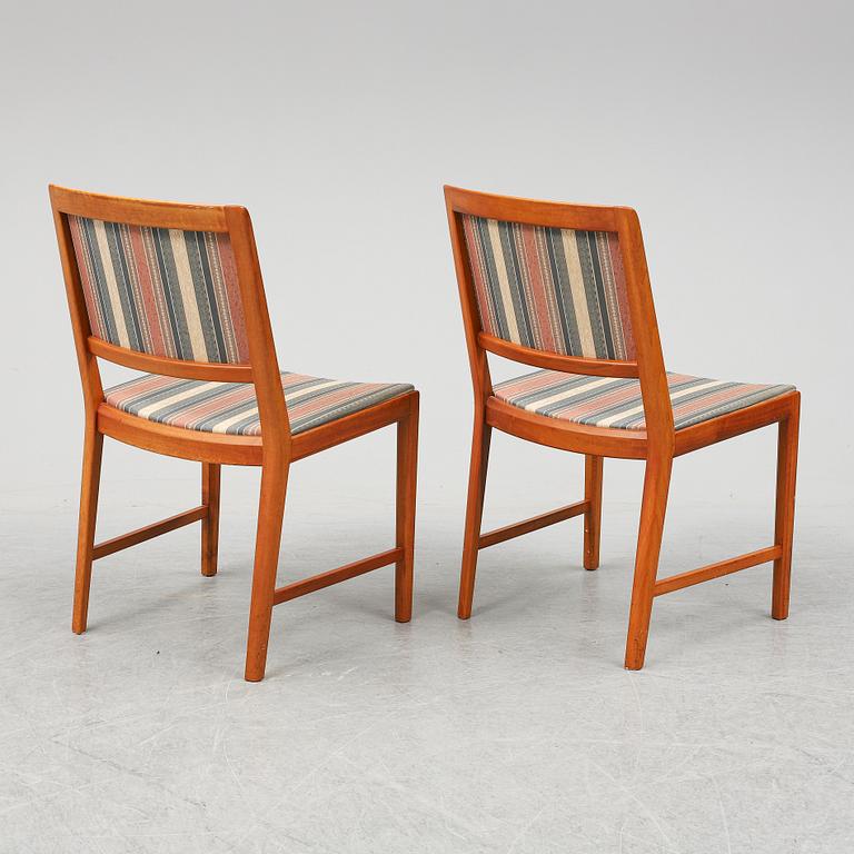 BERTIL FRIDHAGEN, a seven  piece walnut dining suite from Bodafors.