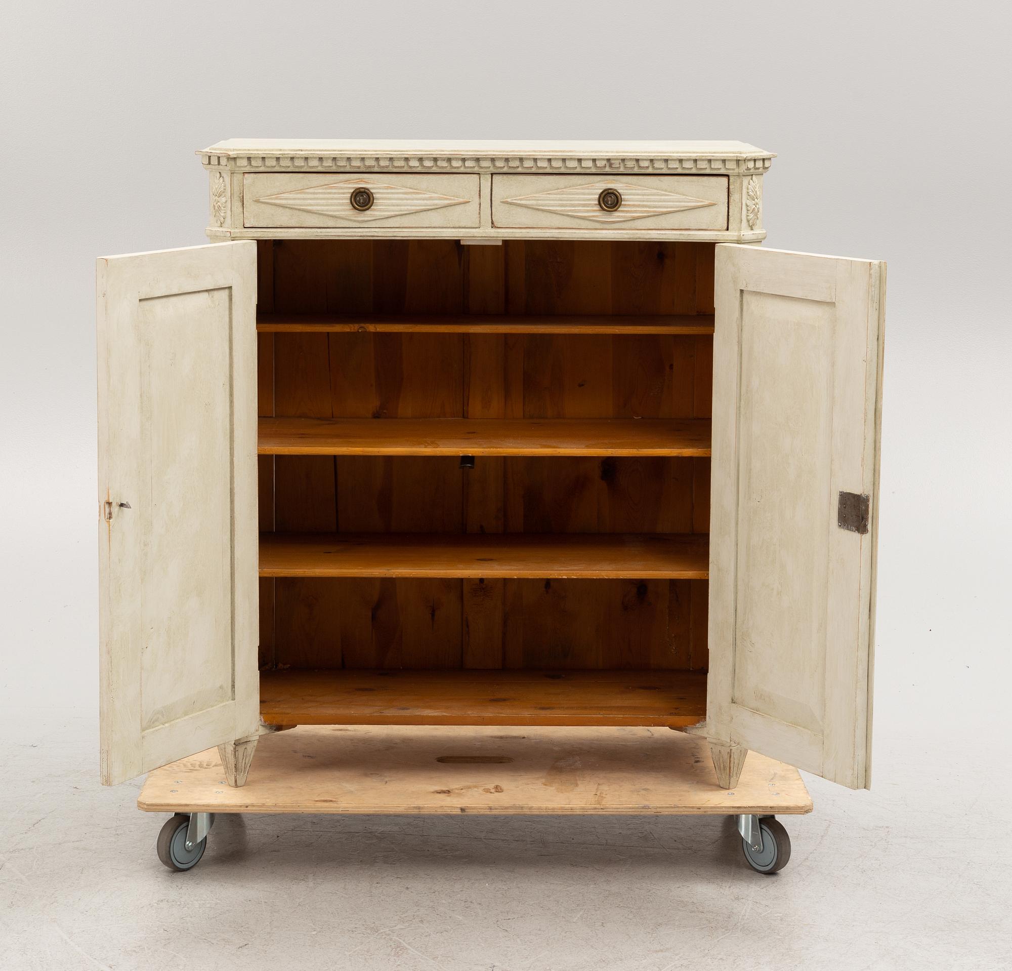 A Gustavian Style Cabinet, 19th Century.