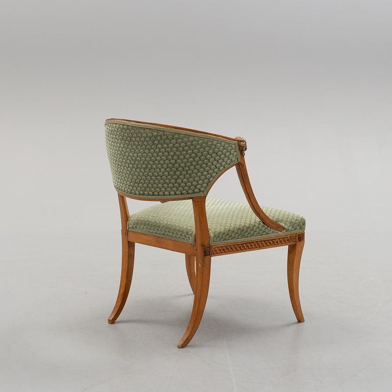 An early 19th century late gustavian armchair.