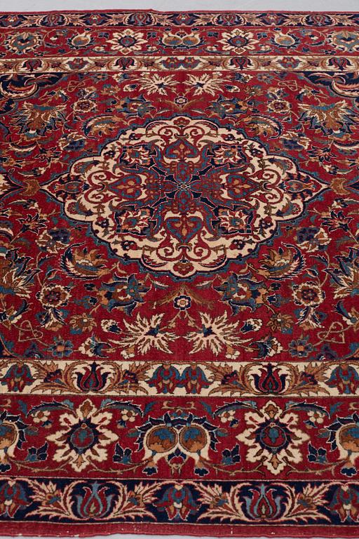 A RUG, a semi-antique Esfahan, ca 213,5 x 143,5-146,5 cm.