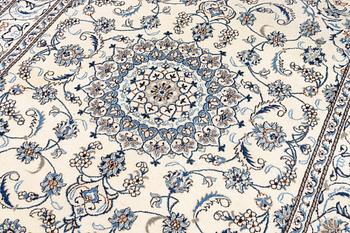 A Nain carpet, c. 275 x 195 cm.