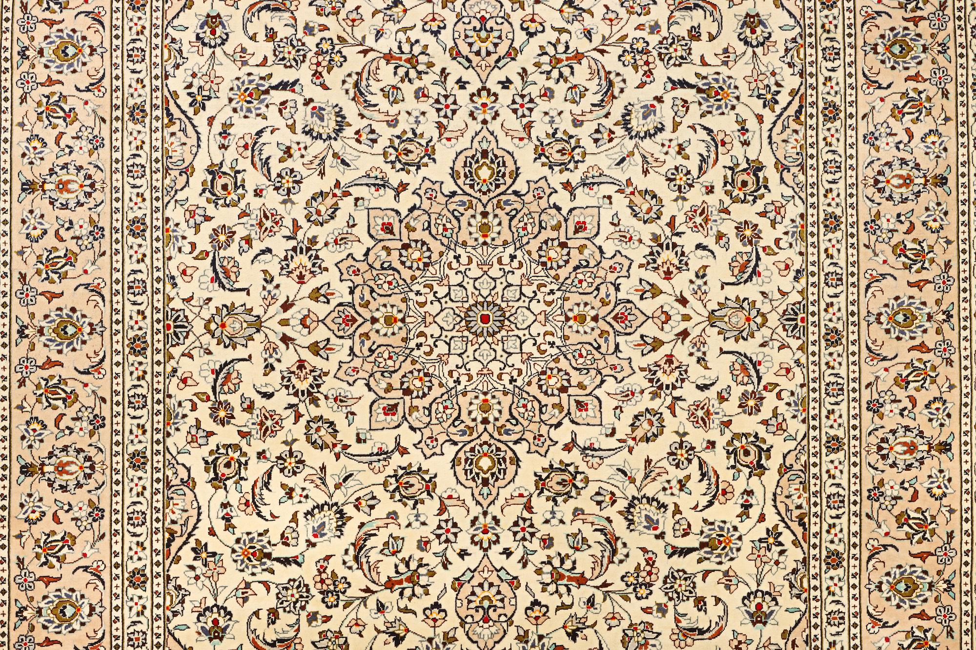 A Keshan carpet, c. 355 x 238 cm.