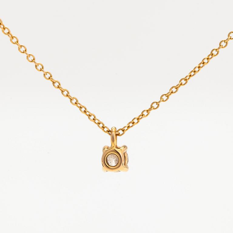 Tiffany & Co, an 18K gold necklace with a diamond ca. 0.17 ct.
