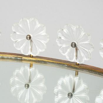 Estrid Ericson,  a mirror and brass table centrepiece from Svenskt Tenn.