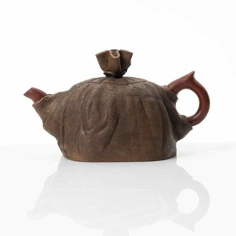 Zhou Dingfang, A naturalistic 'sack form' yixing teapot, China, 1990s.