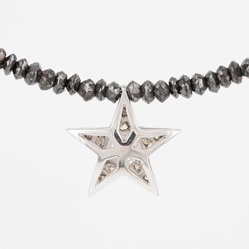 Necklace, Atelier Ajour, black diamonds with a star pendant set with brilliant-cut diamonds.
