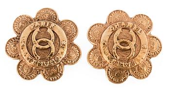 A pair of Chanel earclips.