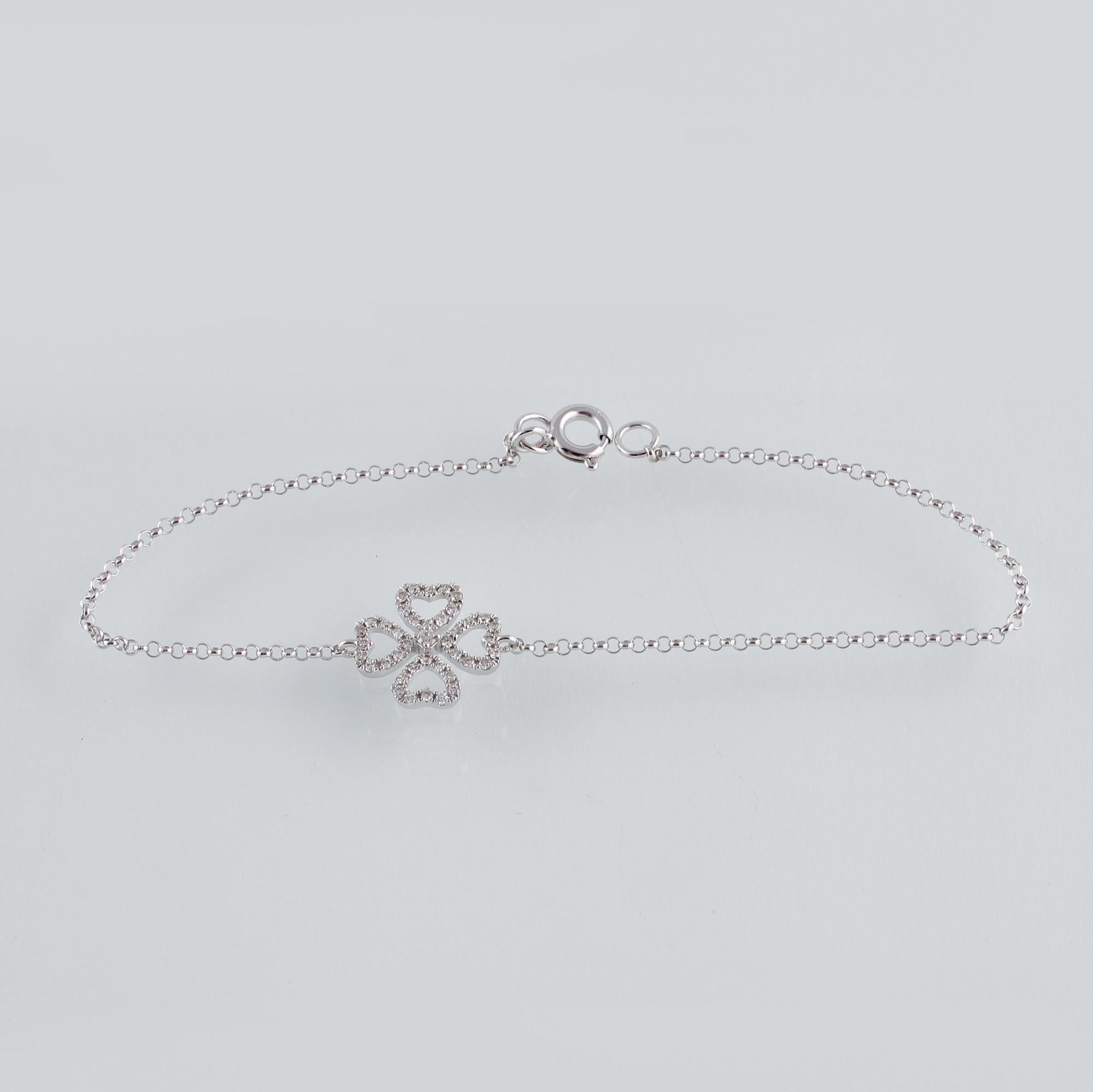 ARMBAND, 18K vitguld med briljantslipade diamanter. Vikt 1,4 gram.