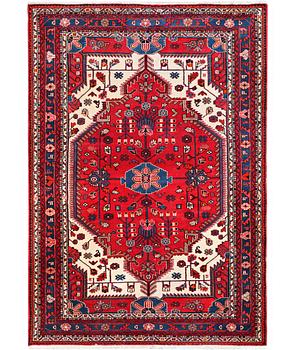 A Hosseinabad rug, c. 230 x 151 cm.