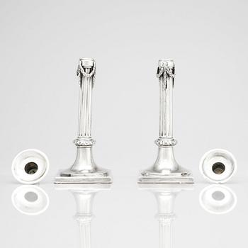 A pair of German 18th century silver candlesticks, marks of Johann Philipp Heckenauer, Augsburg 1787-1789.