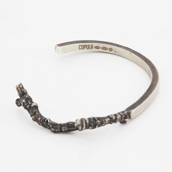 Copula, silver, två armband och en ring.