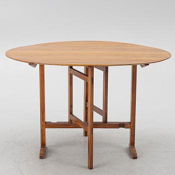 A tilt top table, possibly France, end of the 19th century.