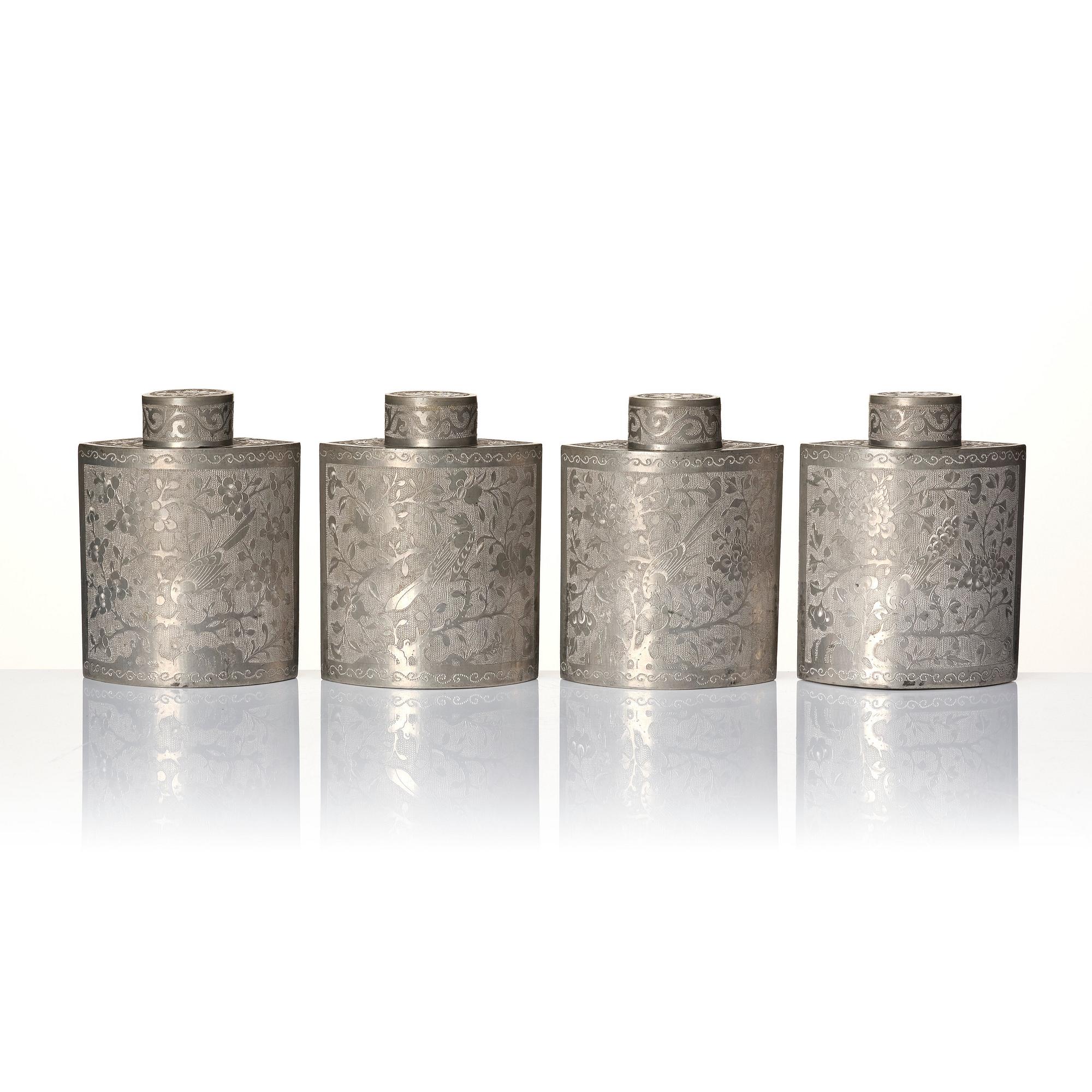 A Chinese lacquer box with a set of five pewter tea caddies, Qing dynasty, 18/19th Century.