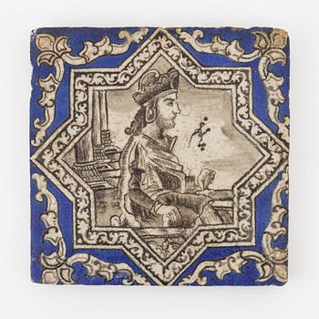 A Persian (Iranian) tile, glazed pottery, Qajar dynasty, 19th century.