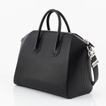 Givenchy, a black leather 'Antigona' bag.