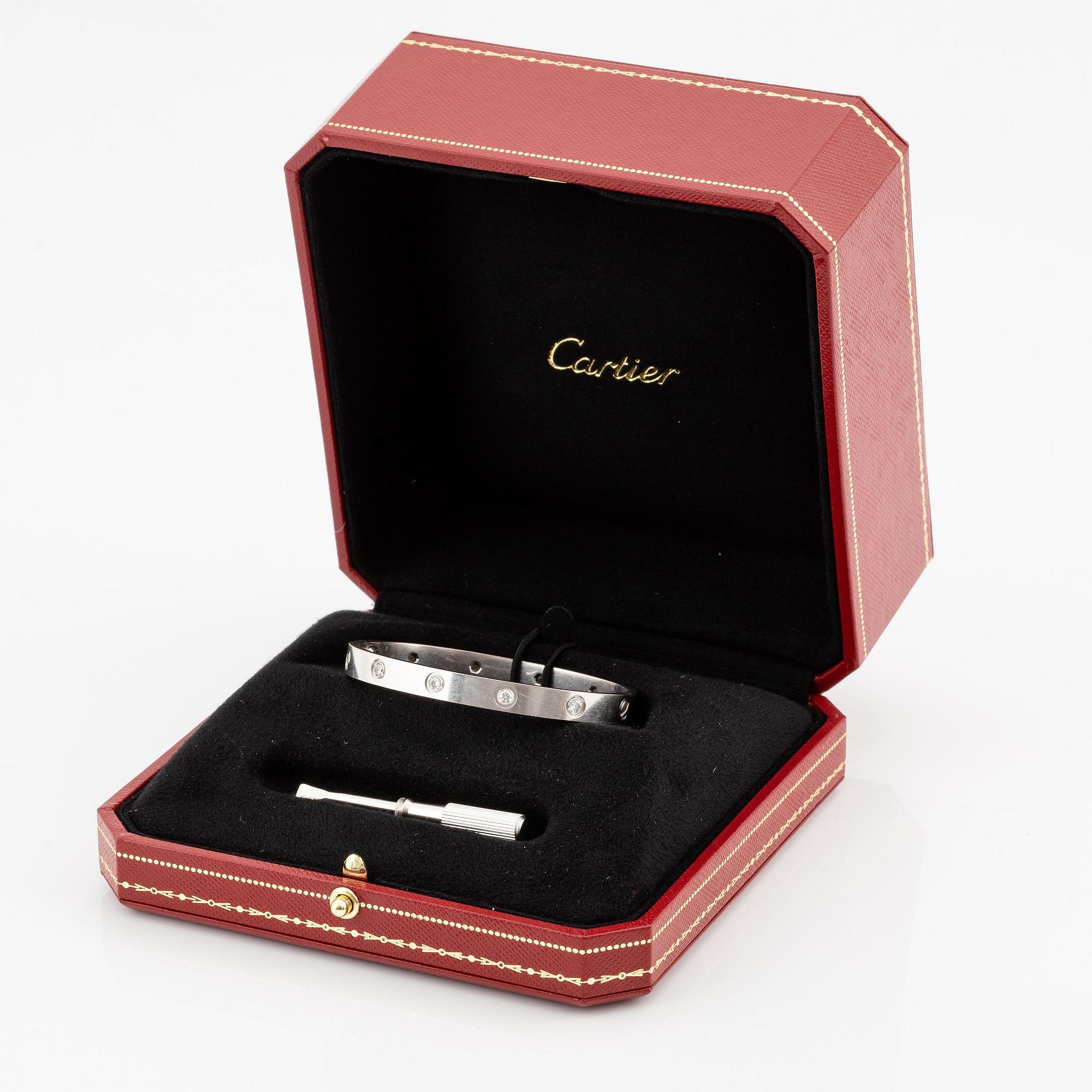 Cartier armband " Love" 18K vitguld med tio runda briljantslipade diamanter.