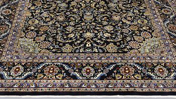A Kashmar carpet, approx. 335 x 248 cm.