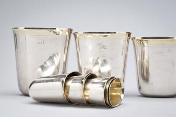 A set of 12 Swedish early 18th century parcel-gilt hunting-beakers and cover, marks of Petter Henning, Stockholm 1707.