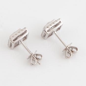 Brilliant-cut and baguette cut diamond earrings.