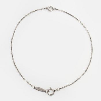 Tiffany & Co, Elsa Peretti, a platinum 'Diamonds by the Yard' bracelet with a brilliant-cut diamond.