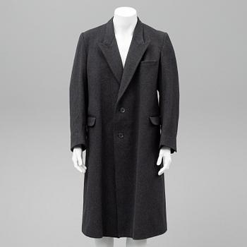 YVES SAINT LAURENT, a wool coat.